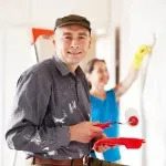 Professional painter completing interior wall painting